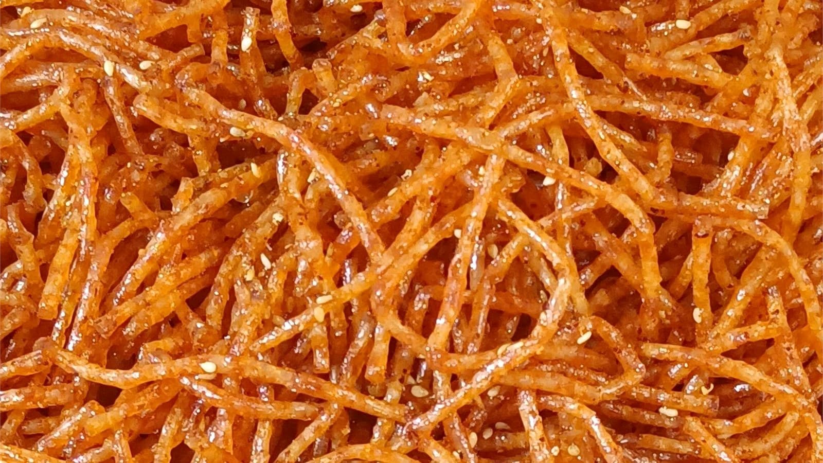 Mala Prince spicy strips showing a richer red oil and seasoning profile